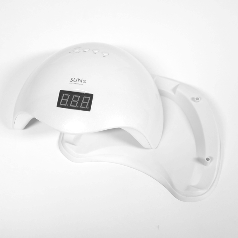 pengering kuku dengan alas yang bisa dilepas